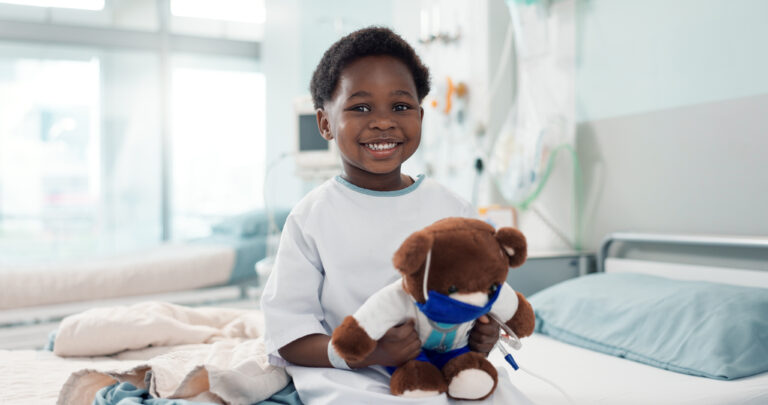 Digestive and Liver Congenital Disorders: Expert Pediatric Surgical Solutions Black child and teddy bear in hospital for pediatric surgery recovery, patient and healthy results.